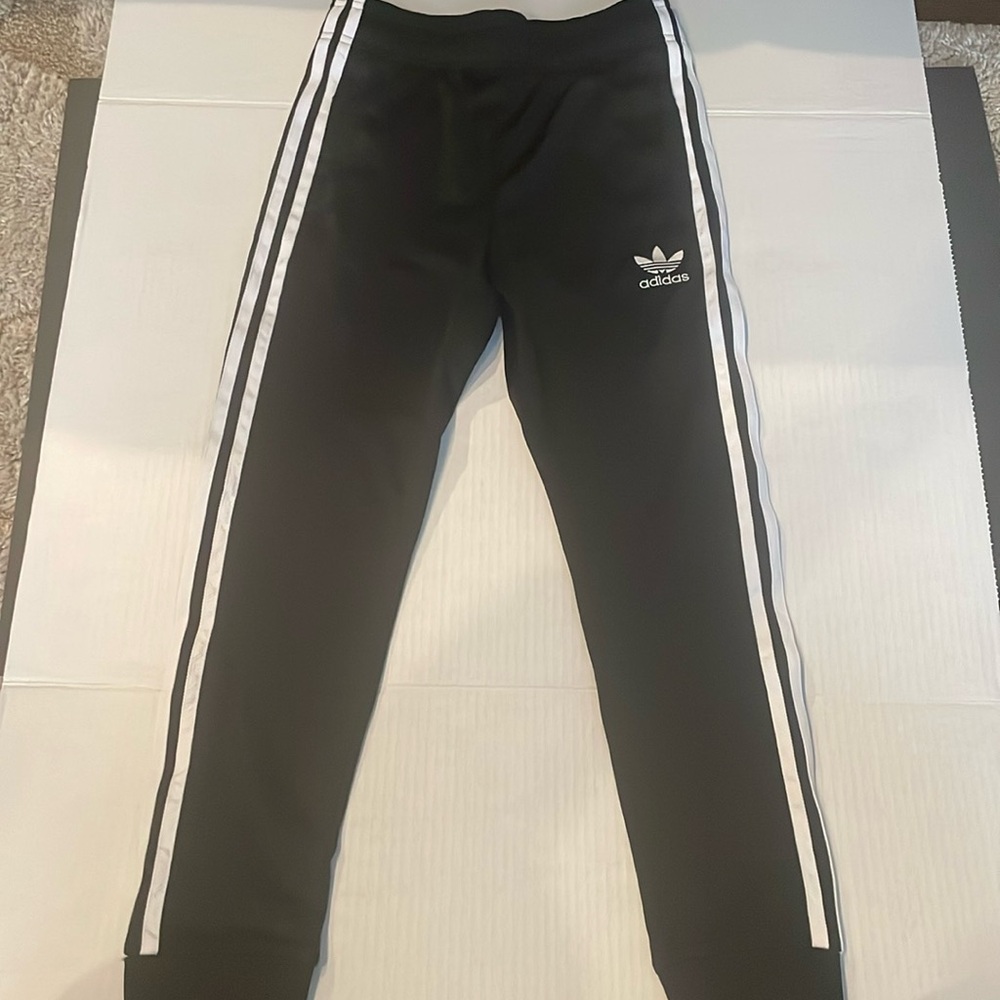 Black and white striped adidas drawstring pants with zipper pockets youth small